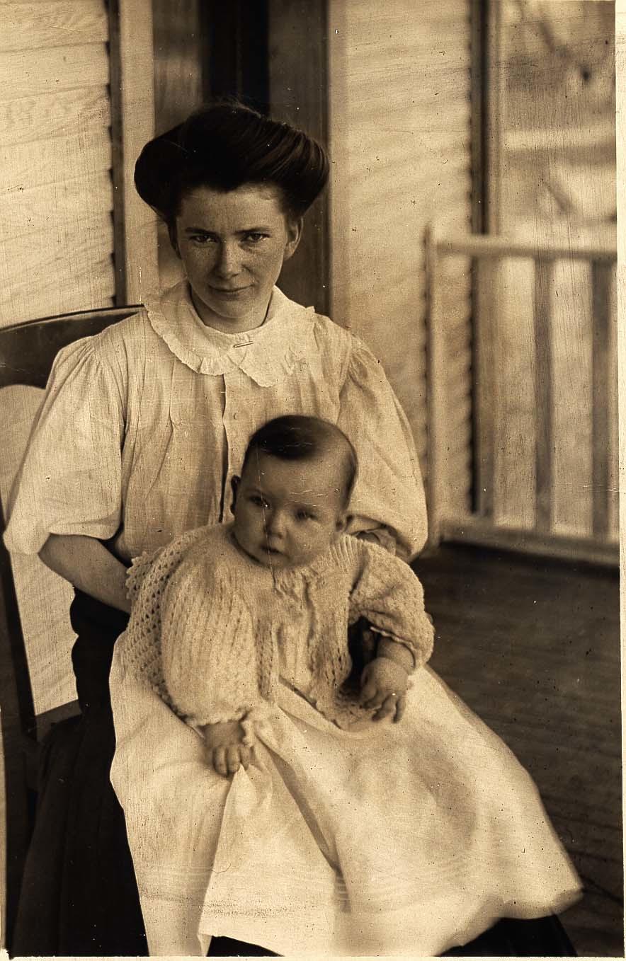 Caroline and John Long Sitting on Porch