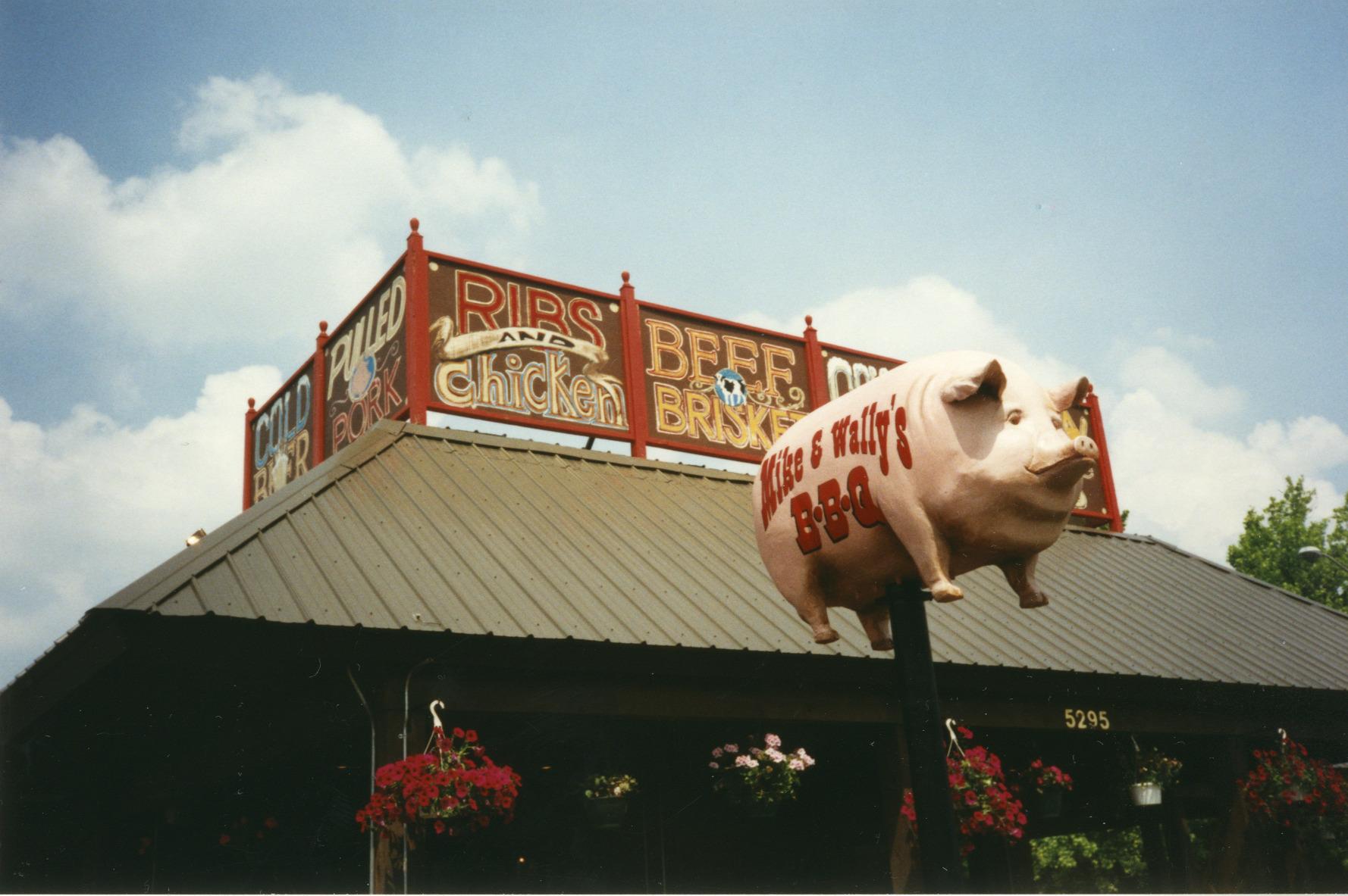 "Mike & Wally's" (Pig Iron) BBQ Pig Statue in Front of the Restaurant