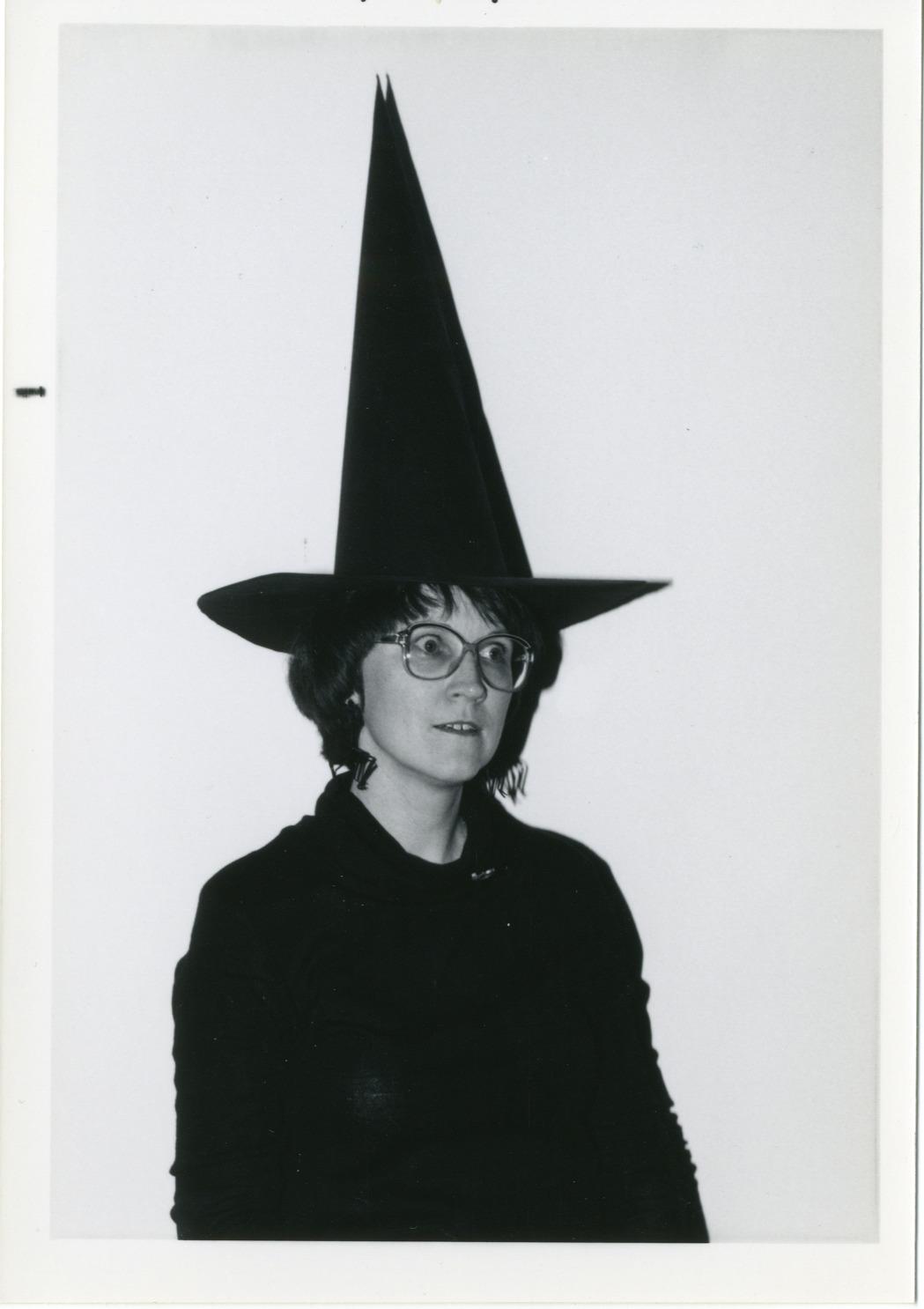 Photograph of Librarian Jo Osborne in a Witch's Hat
