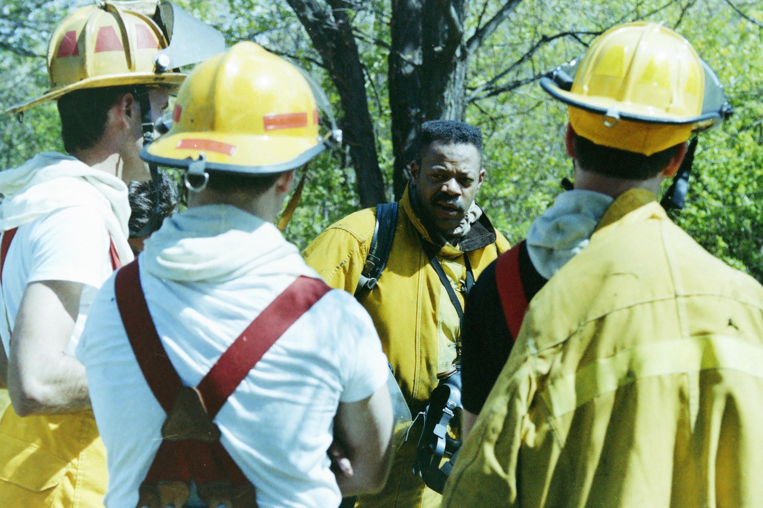 Photograph of William (Bill) Fields, Jr., Speaking to Firefighters