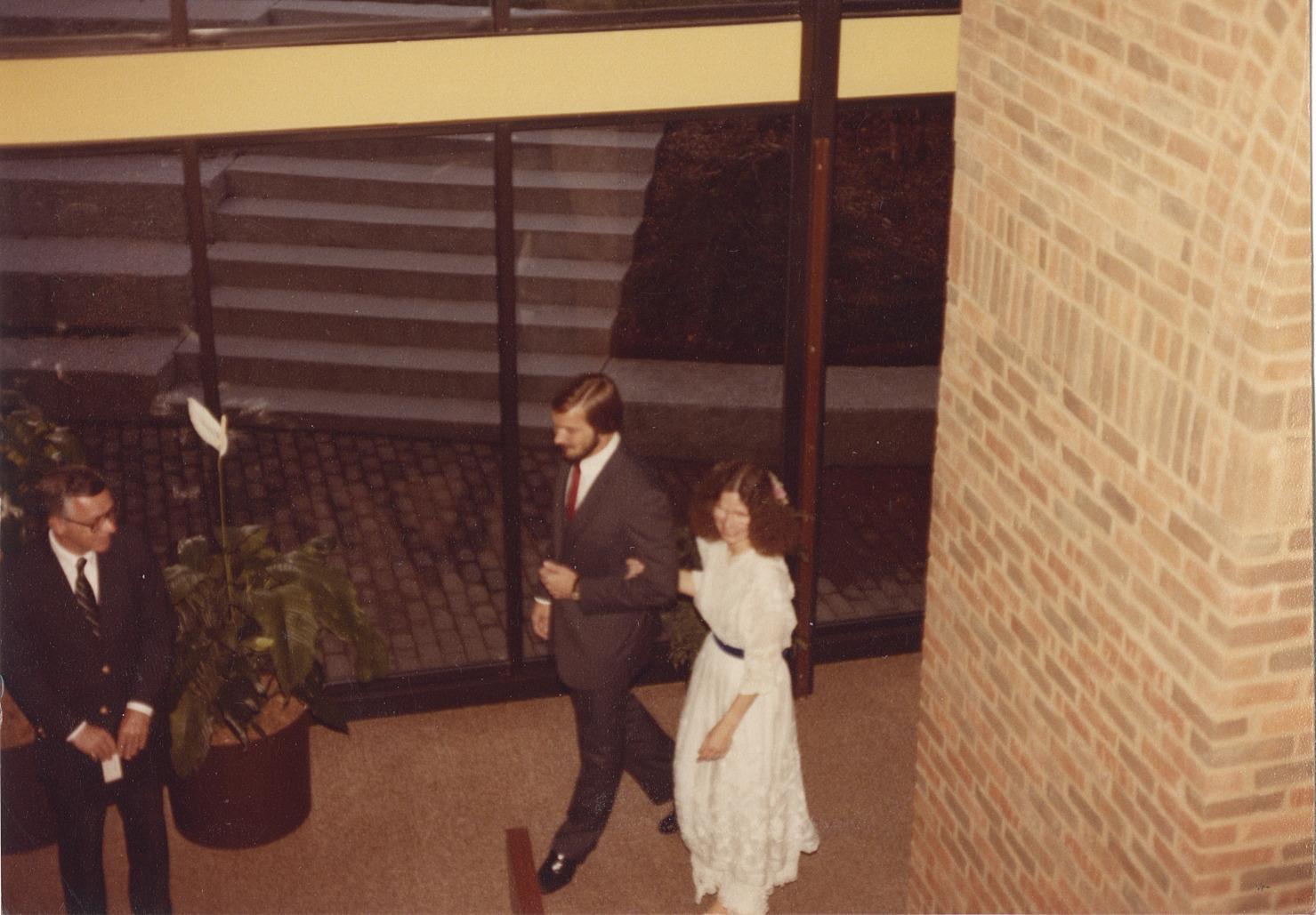 Rachel Alexander and Bob Foulk Walking to Their Wedding Ceremony at the Old Worthington Library