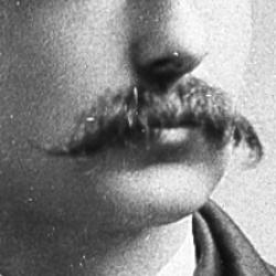 Black and white photo of Eugene Moses Maynard with focus on moustache