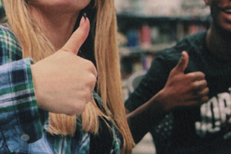 Two hands giving a thumbs up